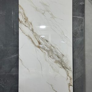 *PORC PUNTEADA MONTPELLIER 60X120 CJX2.16M2X3LX46KG P61219VD  RESIDENCIAL-BLANCO-DORADO-VETEADO